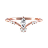 Elegant rose gold ring with a marquise diamond centerpiece, enhanced by sparkling cubic zirconia details.